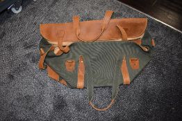 Two sand storm holdalls.