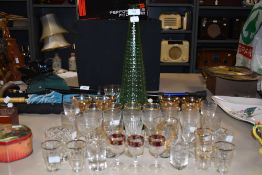 A selection of cocktail wine and spirit glasses including art deco and tumblers