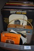 A selection of vinyl records and cossor radio set