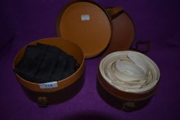 Two vintage collar boxes one containing collars,the other a cummerbund and a box tie.