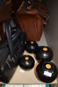 A selection of crown green bowls and bag including Thomas Taylor