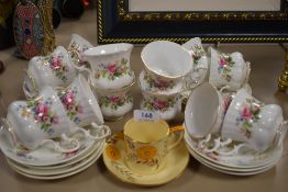 A selection of tea cups and saucers including Royal Albert Moss Rose and Grays Pottery