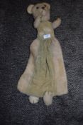 an unusual teddy bear possibly pyjama case