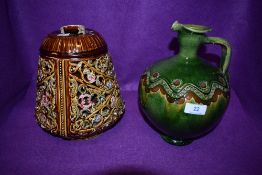 An unusual Minton Majollica style vase or lantern having incised floral outer body with inner (AF)