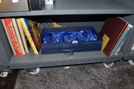A boxed set of wine glasses and selection of childrens annuals
