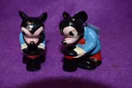 Two vintage Marx toys Walt Disney Mickey mouse figures with bobbing heads.
