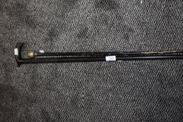 a HM silver swagger stick and similar hand carved ebony walking stick