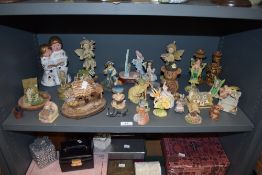 A collection of figurines of animal,childhood and fairy interest.