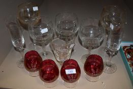 A collection of glass including four vintage red brandy glasses with gilt edging, twelve in total.