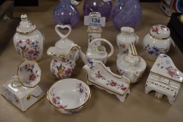 A collection of Hammersley miniature ornaments, with gramophones, urns, pianos and kettles being