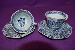 Two tea cup and saucer sets having early Chinese design transfer print with tin glaze stamped A.P to