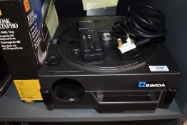 A Simda slide projector and carousel in hard carry case