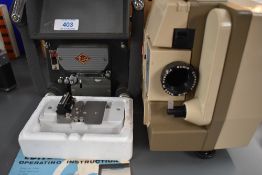 A Dia mond Super 8 editor, a K8 splicer, and a Eumig P8 projector