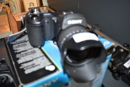 A Sony Cybershot digital camera in original box with charger etc