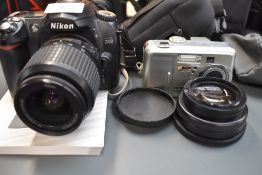 A Nikon D50 digital camera with Nikkor 18-55mm lens and Vitacon0.45x wide lens and Kodak Easyshare