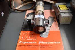 An SEI Exposure Photometer in leather case A/F and Dallmeyer projector lens
