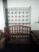 An early 20th Century oak bed, labelled Staples & Co, width 120cm