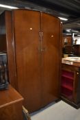 A mid 20th Century oak and ply wardrobe