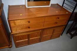 A vintage teak Nathan base unit, width approx. 102cm