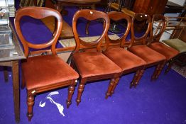 A set of five balloon back dining chairs with upholstered seats