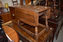 A Priory style drop leaf occasional table