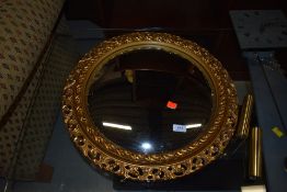 A reproduction gilt frame mirror, approx diameter 52cm, convex mirror