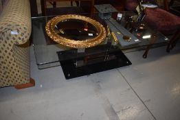 A modern glass coffee table, approx. 120 x 65cm