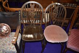 Two hoop backed oak dining chairs