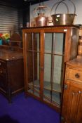 An early 20th Century bookcase, width approx. 85cm