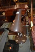 A vintage angle poise lamp, in brown