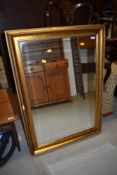 A gilt frame wall mirror, 75 x 106cm