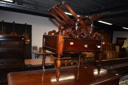 A reproduction mahogany canterbury