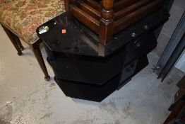 A glass TV stand, width approx. 80cm