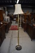 A traditional brass standard lamp on mahogany base, probably early 20th century, approx. height