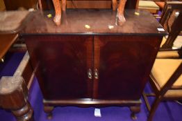 A period style mahogany TV cabinet on cabriole legs, approx width 82cm