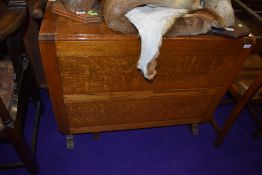 A traditional oak gateleg table