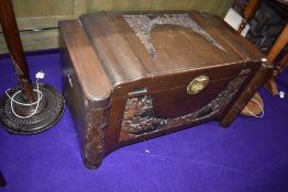 A Chinese bedding box having carved panel decoration