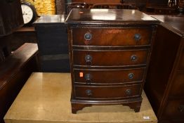 A reproduction Regency style dwarf chest of four drawers, height approx. 60cm