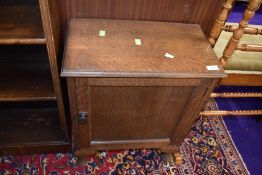 An Edwardian oak pot or bedside cupboard