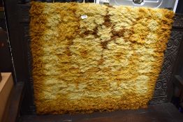 A vintage wool/nylon rug labelled St Michael (Marks & Spencer) , approx. 91 x 152cm