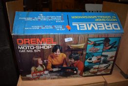 A vintage Dremel moto shop scroll saw/sander in original box