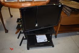 A Panasonic 26 inch TV, Humax freesat box and stand