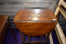 A small size drop lead table having barley twist legs