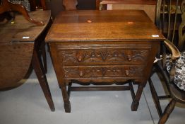 A traditional oak two drawer side chest, width approx. 64cm