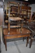 A Victorian mahogany fold over tea table having inlaid frieze, and a traditional rush seated country