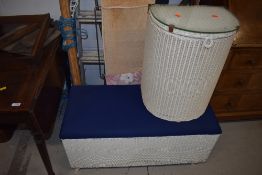 A vintage Lloyd Loom ottoman and demi lune laundry basket