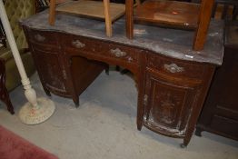 An Edwardian mahogany and inlaid desk or dressing table, in distressed condition, nice quality