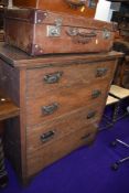 An Edwardian oak chest or four drawers