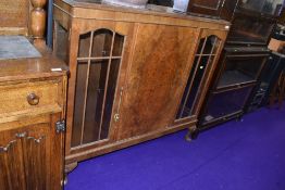 An early to mid 20th Century walnut display cabinet, width approx. 120cm