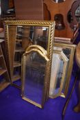 A selection of gilt and plaster effect hall way and mantle mirrors five in total